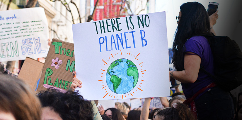 Value 6 Image featuring group of protesters supporting sustaining the planet